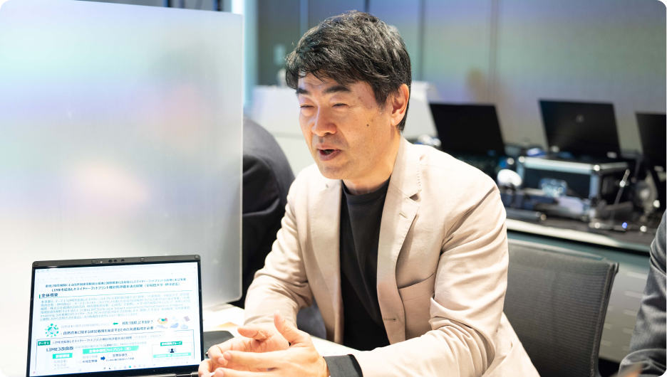 伊坪 徳宏氏